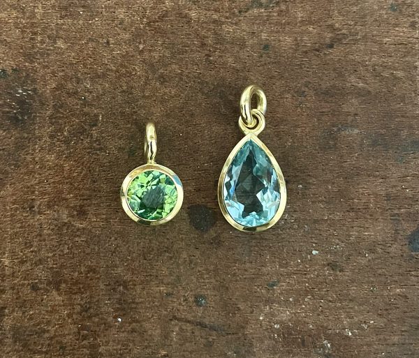 lindgrüner Turmalin in 750/-Gelbgold mit einem Brillanten