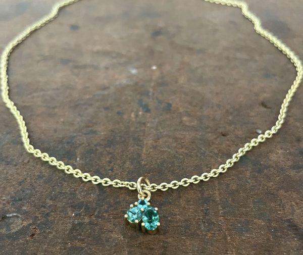 Anhänger aus drei Turmalinen in 750/-Gelbgold